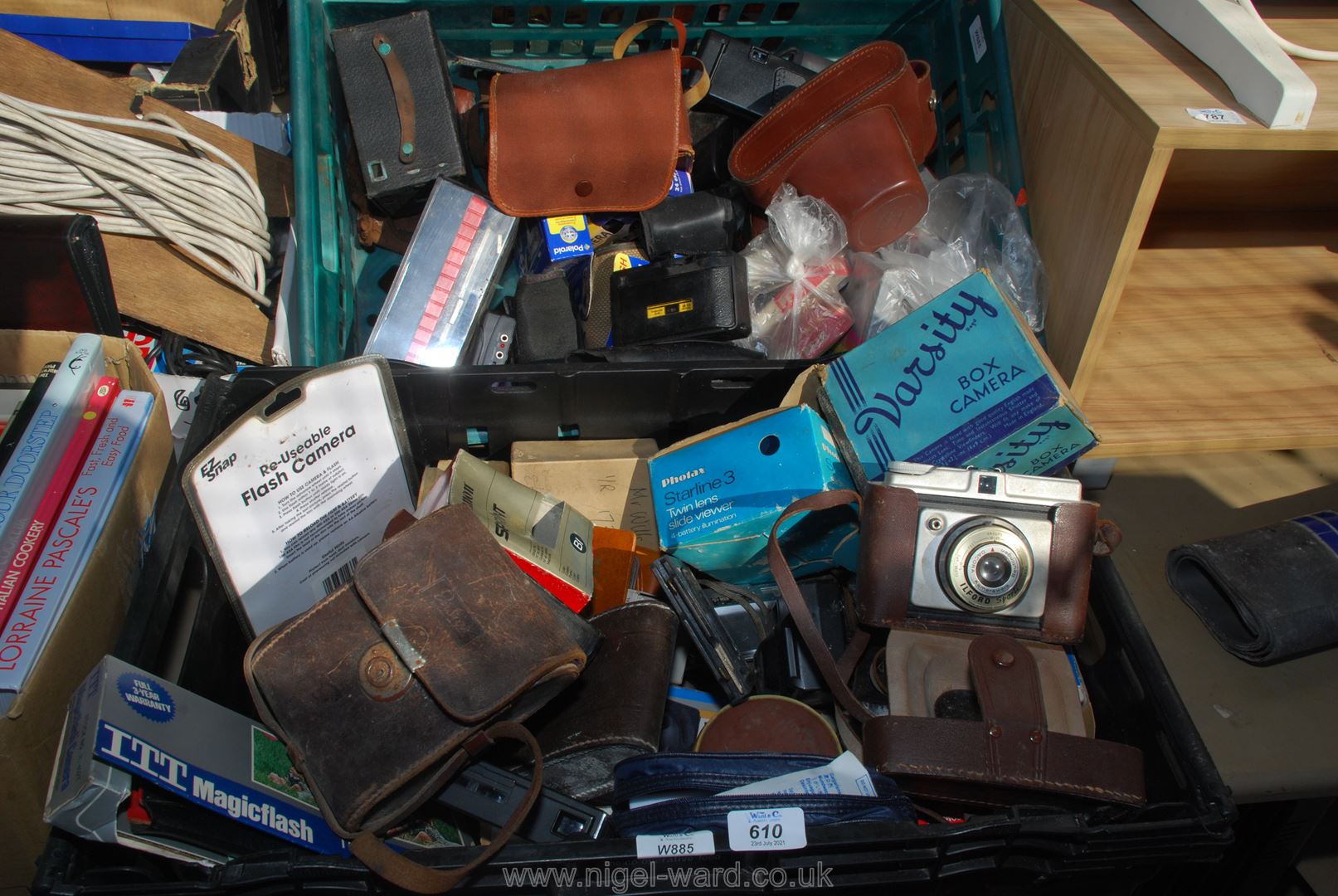 Two crates of various cameras and cases