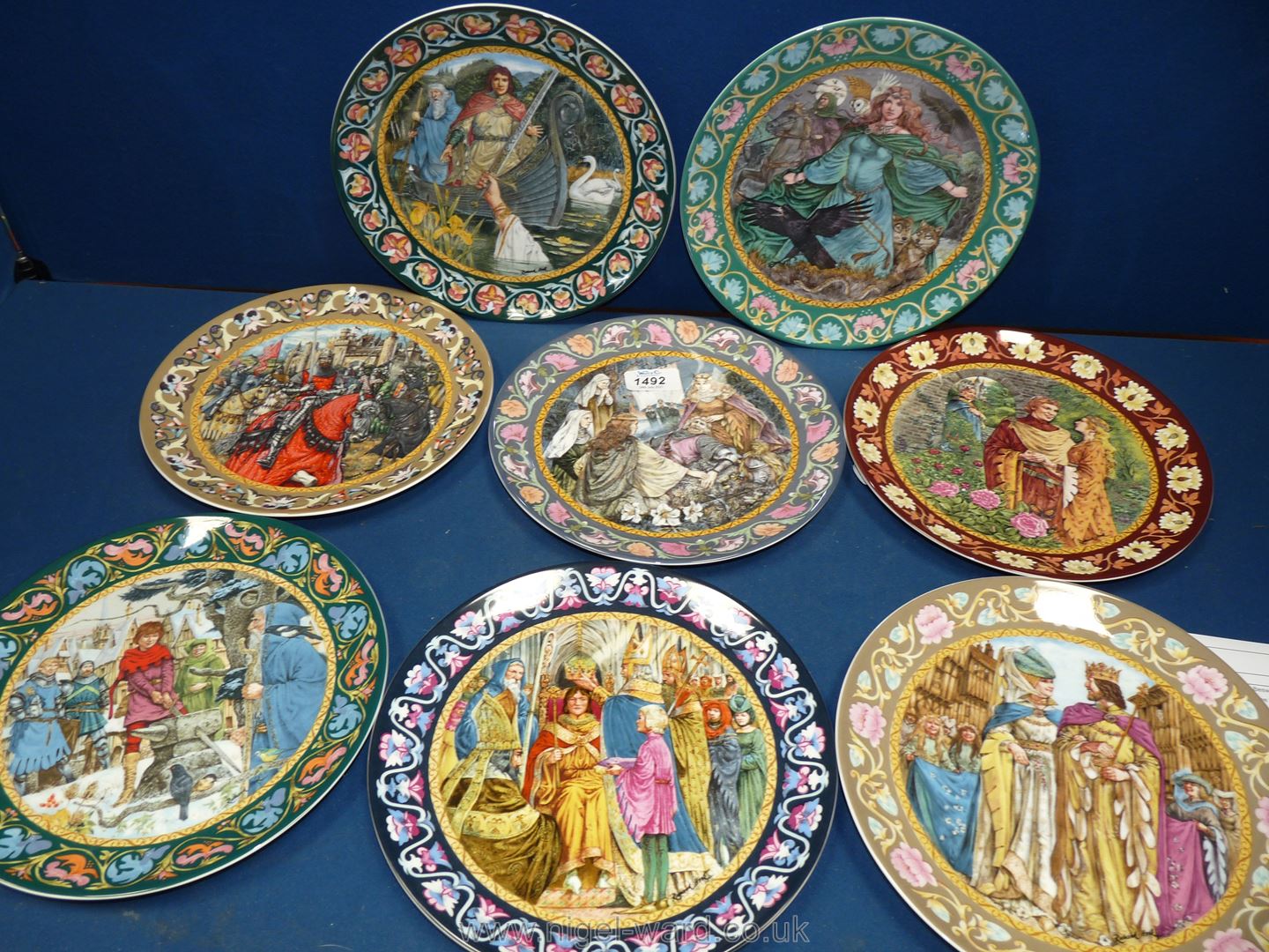 Eight Wedgwood 'The Legend of King Arthur' display plates with certificates.