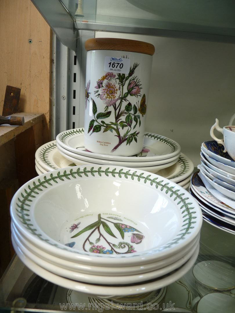 A quantity of Portmeirion Botanic Garden dinner plates, side plates and a storage jar.