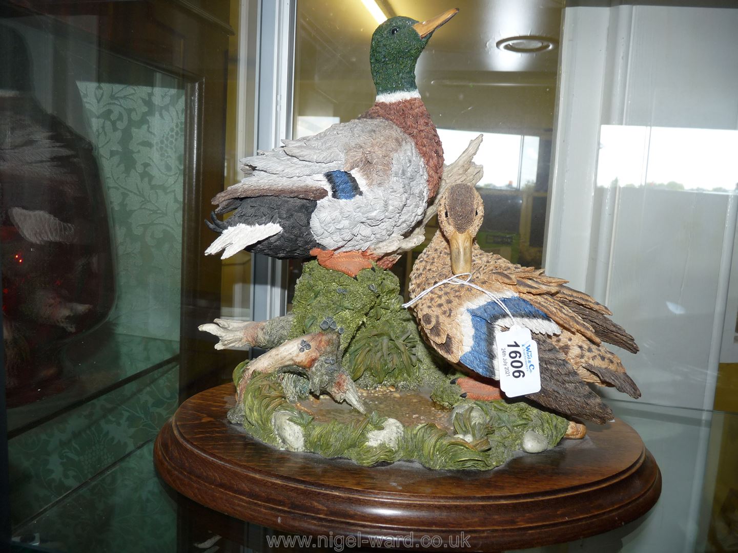 A Country Artists figurine of two colourful ducks 'Restful days'.