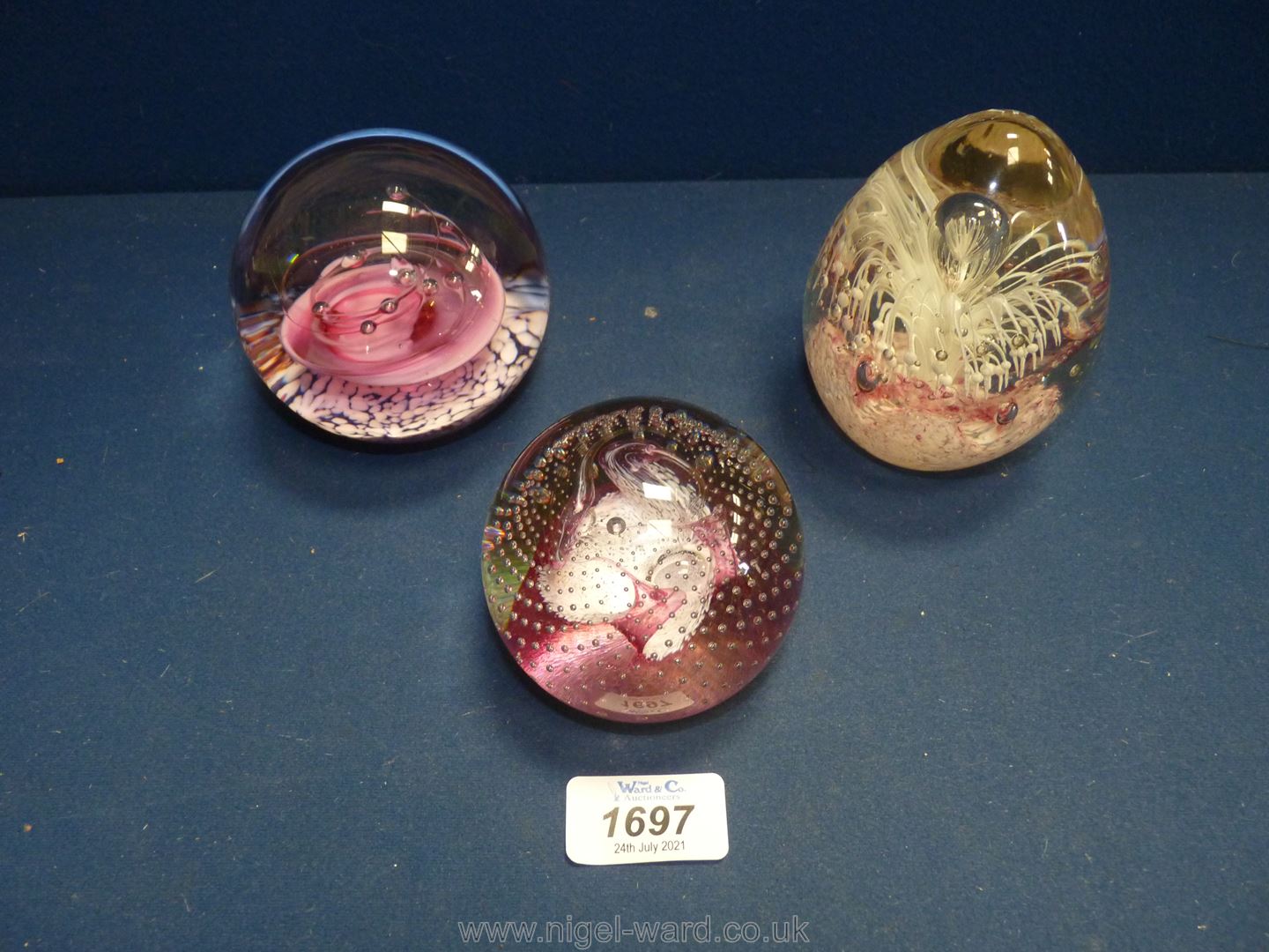 Three Paperweights including Selkirk in pink shades.