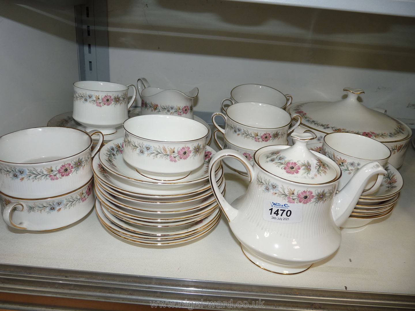 A part Dinner and Teaset, Paragon 'Belinda', including a lidded tureen, meat plate, teapot,