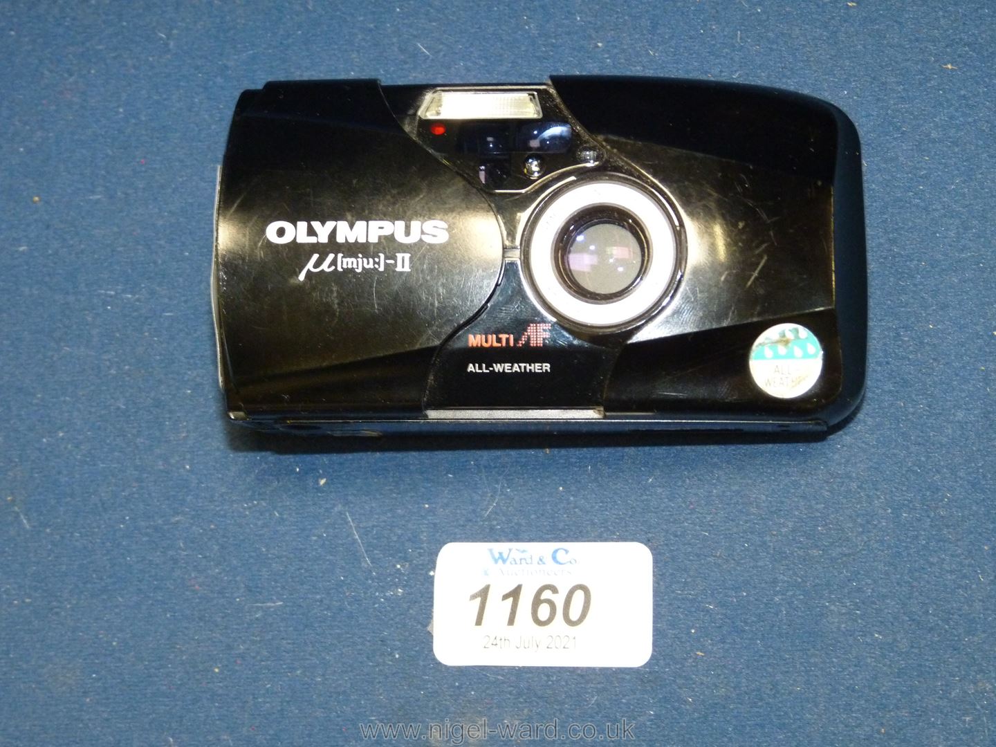 An Olympus MJU II Ultra Compact 35mm All Weather Camera having an Olympus 35mm f/2.8 Lens.