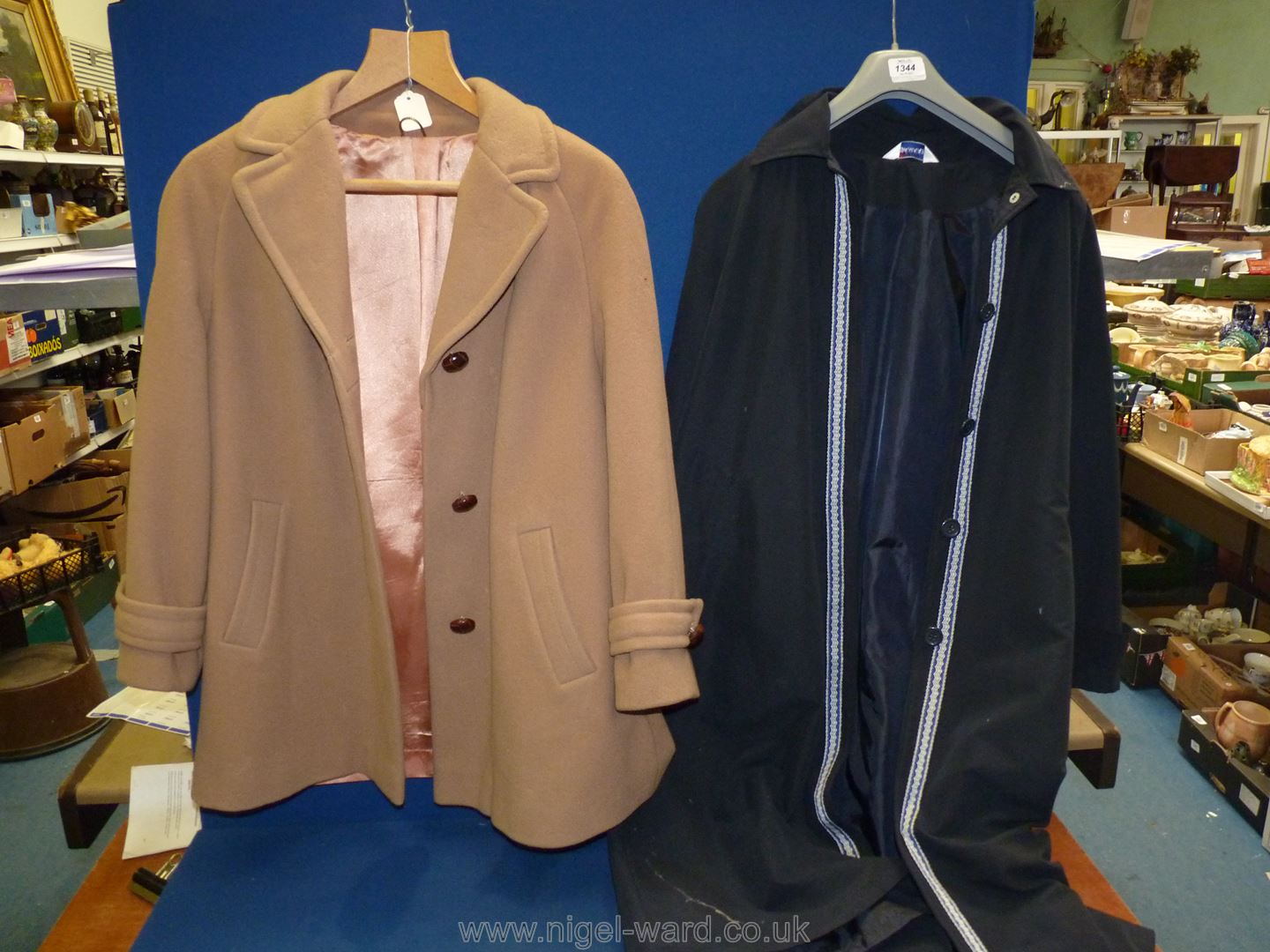 A camel coloured pure wool coat by English Lady and a Damart raincoat.