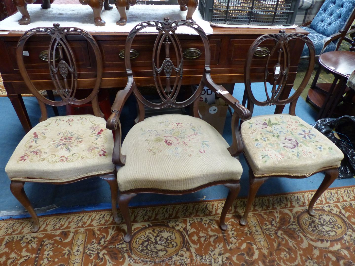 Three elegant Mahogany framed side Chair having delicate fretworked and caned backs,