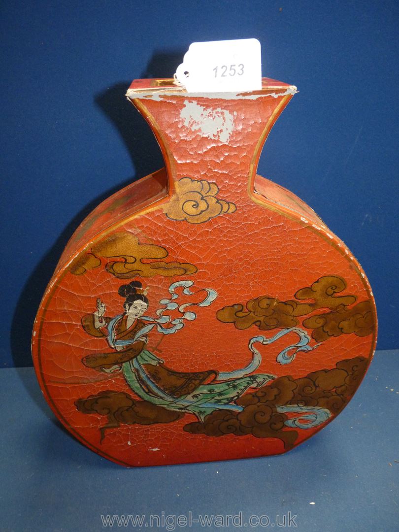 A large oriental papier mache vase, flat sided bottle shape,