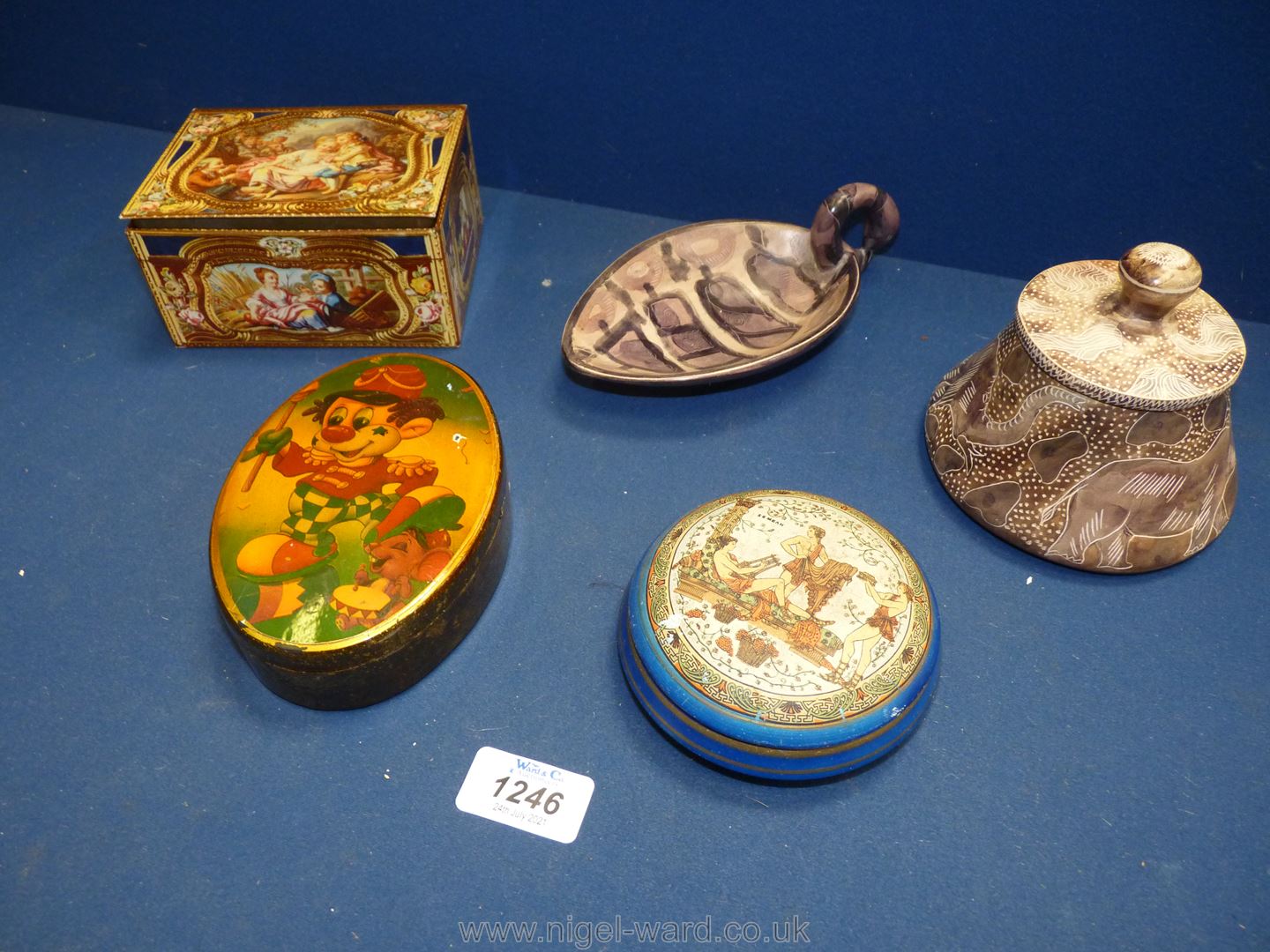 A small quantity of trinket boxes including Bakelite with clown detail, stoneware etc.