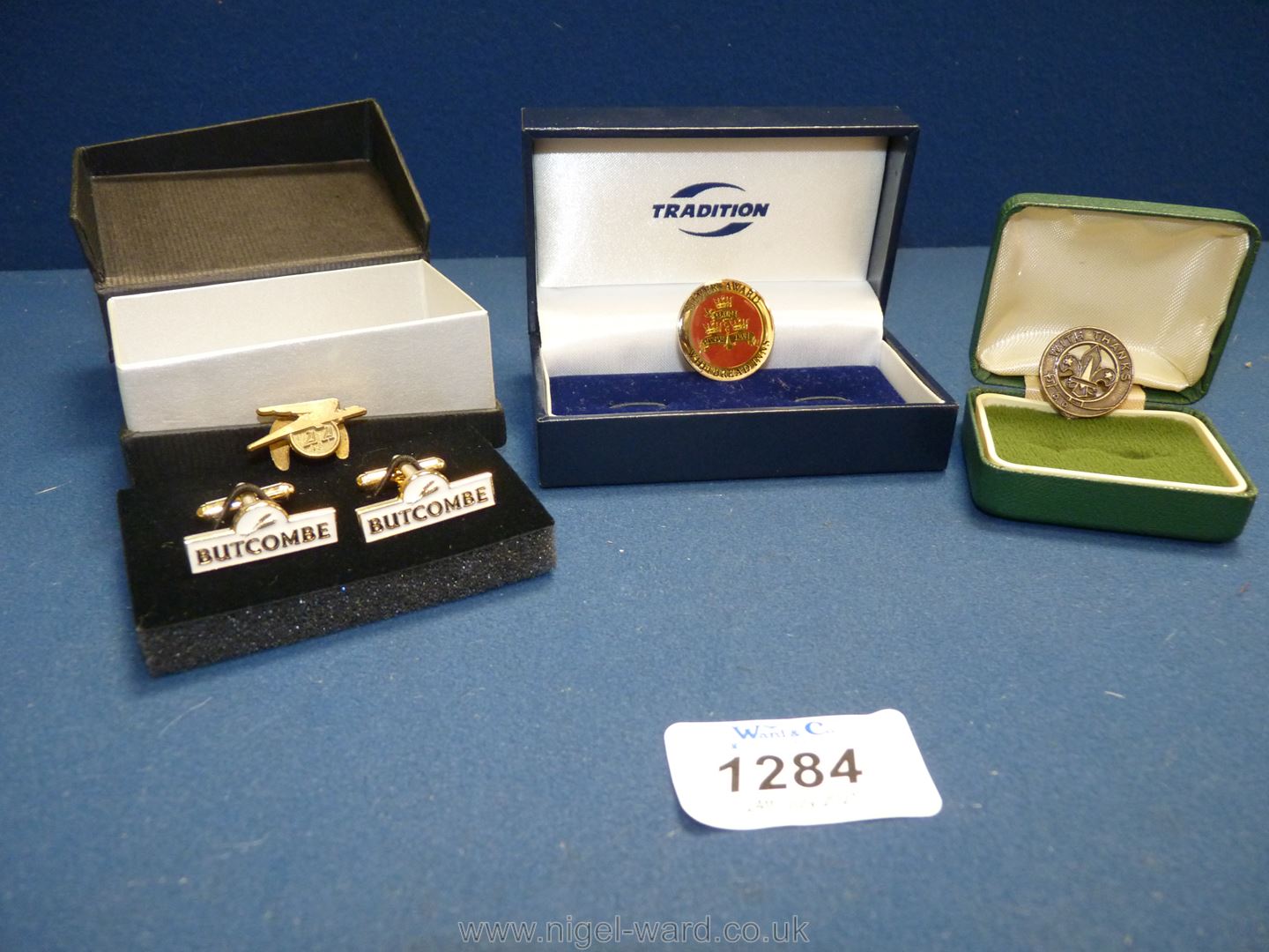 A Scouting badge 'with thanks', a pair of Butcombe cuff links, a silver award for Whitbread Inns,