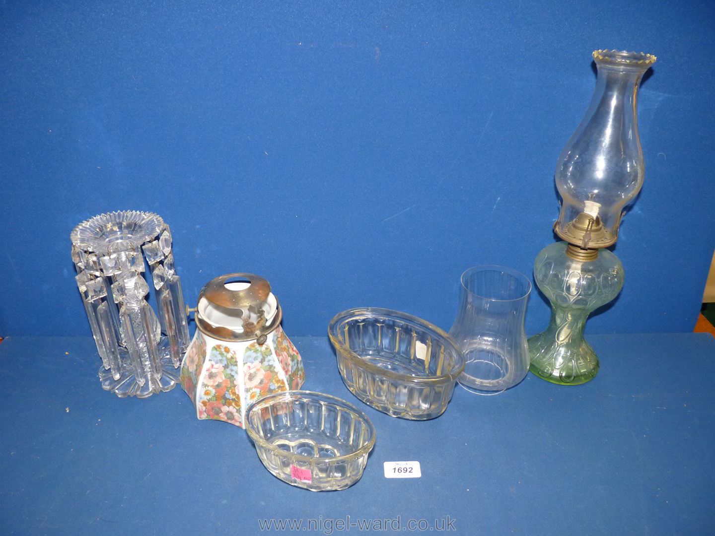 A small quantity of glass including a lustre with droppers, oil lamp, two jelly moulds,