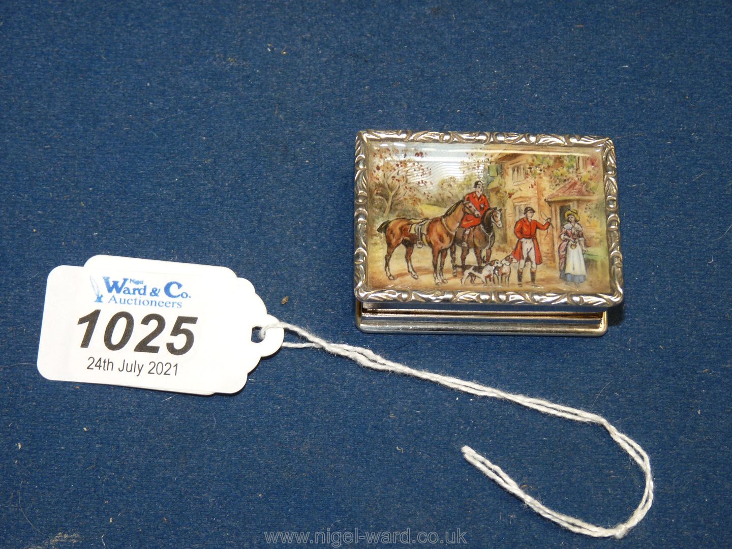 A Silver pill box with enamelled scene to the lid of hunt gathering, Birmingham, 1978, maker F.G.