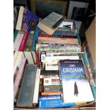 A box of novels, John Grisham, Maeve Binchy etc.