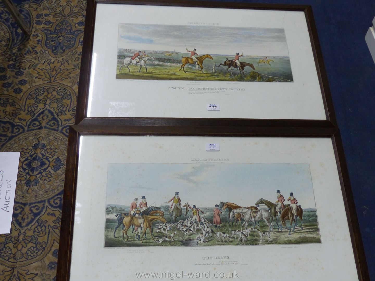 A pair of oak framed hand coloured aquatints of Leicestershire hunting scenes by Sir John Dean Paul.