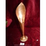 A copper vase in the form of a single Calla Lily bloom with beaten edges 14'' tall..