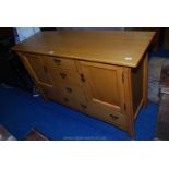 Modern light Oak Sideboard with three drawers over two cupboard, makers 'Sherry',