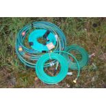 Quantity of various garden hoses