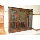 Three door leaded and glazed display cabinet 54'' x 46'' x 11'' deep.