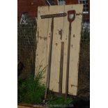 Small wooden door (29" x 52"), rake,