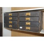 2 x four drawer wooden filing cabinets with Hessian effect finish,