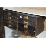 2 x four drawer wooden filing cabinets with Hessian effect finish,