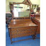 Bedroom chest of three drawers and matching mirror backed three drawer dressing table.