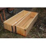 Two homemade wooden planters,