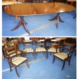 Double pedestal extending Table and set of six dining chairs.