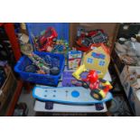 Two boxes of children's toys including Penny skateboard, Peppa Pig,