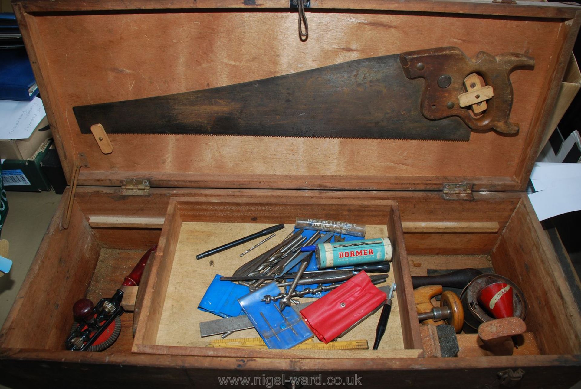 Carpenters tool box containing various saws, planes, mallets, drills etc.