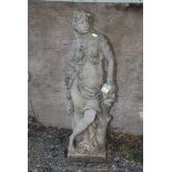 Concrete garden statue of semi clad lady, 47" high (right arm a/f).