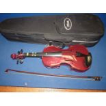 A cased half size 'Archetto Presto' Violin, with bow.