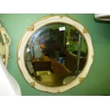 A circular wall Mirror with gilt and crackle finish frame, 23 1/2'' diameter approx.
