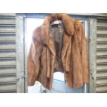 A short 'Saga Mink' fur jacket by James Smith Furriers. Size M-L.