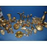A quantity of brass including; money boxes, letter rack, candlesticks, vases, ash tray, rabbit, etc.