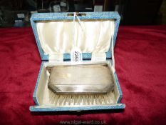 A boxed Silver Art Deco style hair brush and comb, Birmingham maker, Daniel manufacturing Company,