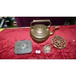 A copper kettle with acorn finial,
