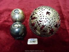 A silver pierced night light cover, marked Birmingham 925, plus two metal beakers.