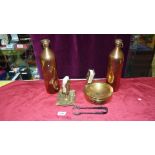 Two brass flasks, two brass match holders and a pair of plated sugar tongs.