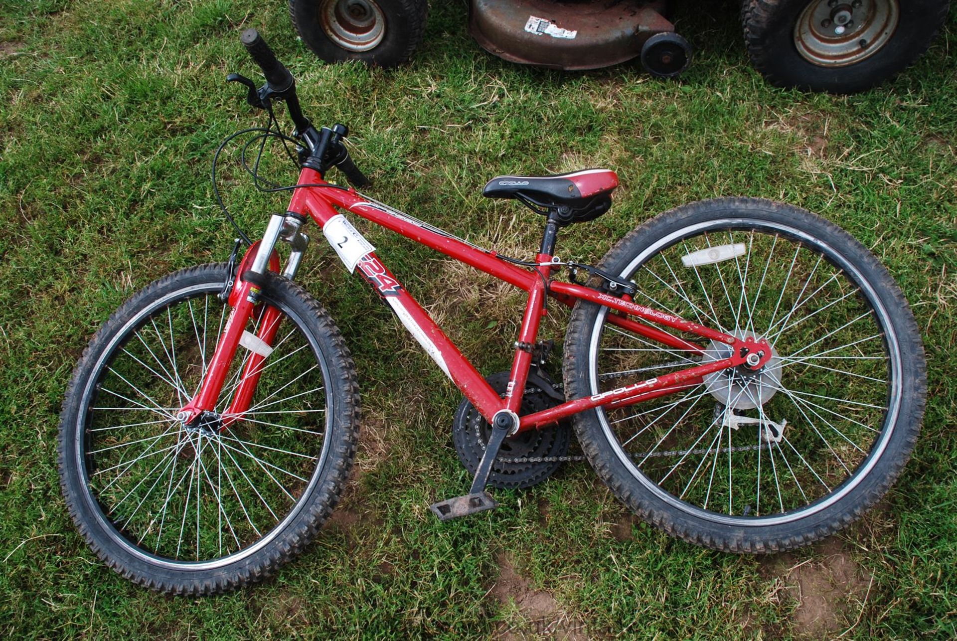 Apollo XC24 child's Bicycle with 18 speed Shimano deraileur gears.