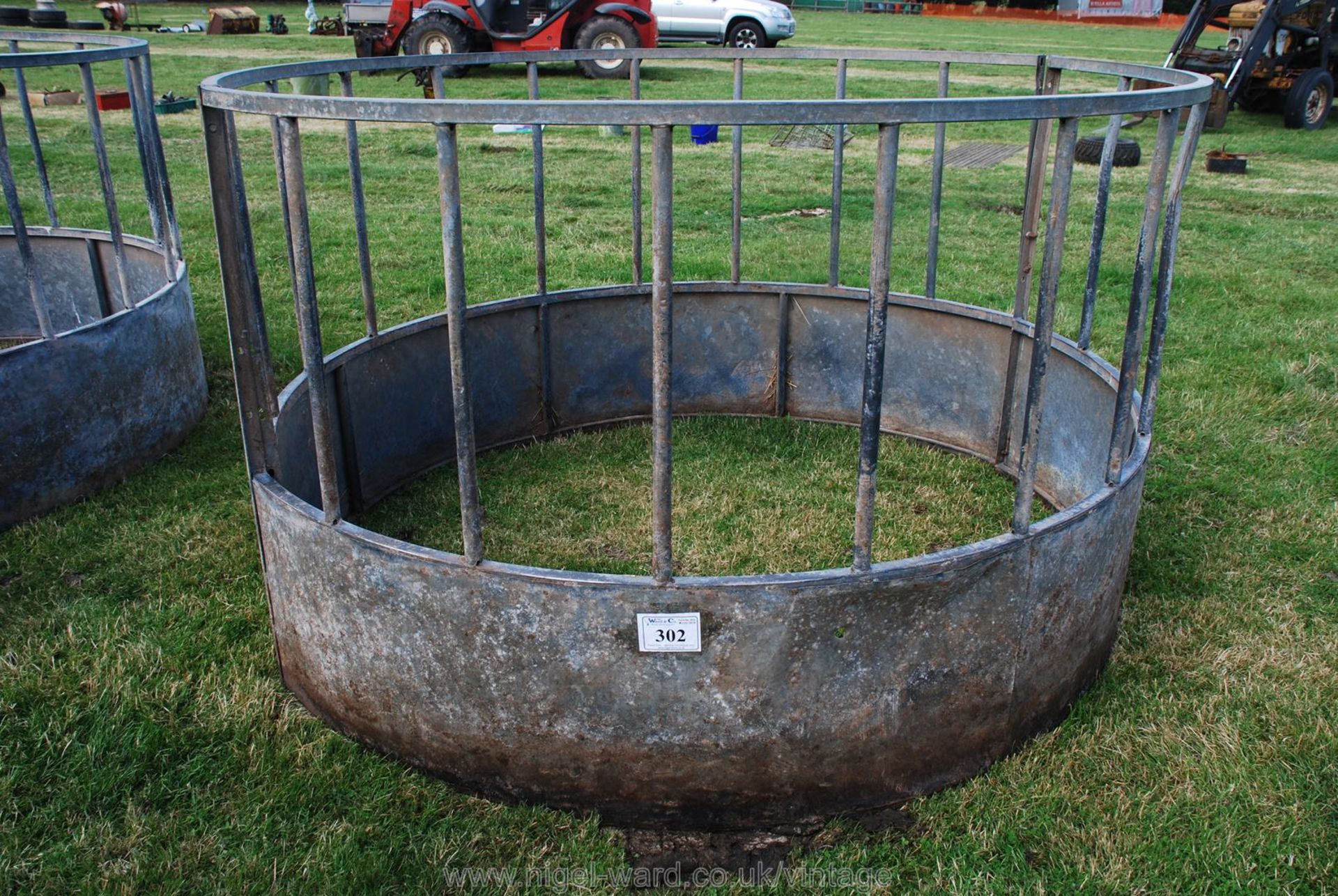 A large round cattle feeder for silage/hay, etc.