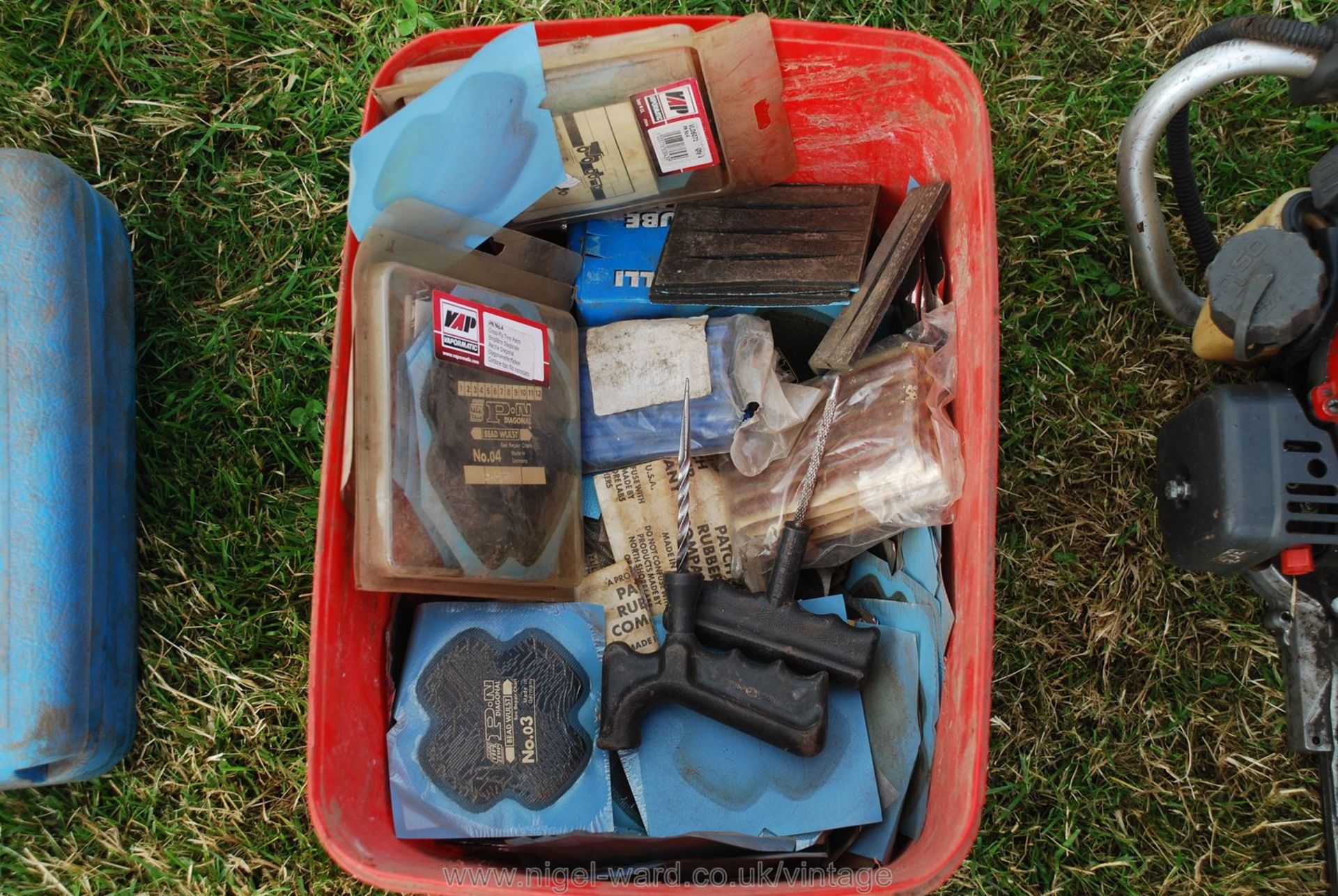 A box of various tyre repair patches and gaiters.