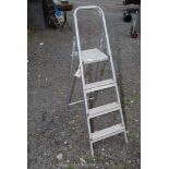 A three rung aluminium stepladder.