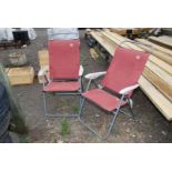 Two folding deck chairs with cushion seats