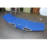 Blue folding sun lounger