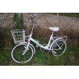 Raleigh Shopper bicycle, three speed with basket.