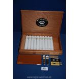 A part box of Freeman & Sons, Medallion Havana Tobacco Cigars with cigar cutters.