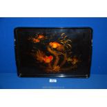 An oriental black lacquered Tray decorated with goldfish, 16 1/2'' x 11 1/2''.