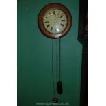 A Victorian postman's wall Clock with pendulum and weights.