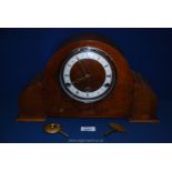 A 1930's Mahogany Pervale mantle Clock with key and pendulum, Roman numerals, 15" wide.