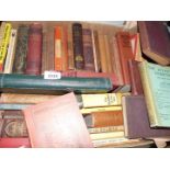 A box of books including Tale of Two Cities, The Old Man at The Zoo,