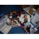 A box of Laser Disk LP's of films including Safe Passage, Wild Card, Being Human etc.
